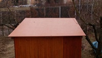Střecha zahradního přístřešku po rekonstrukci. Použitá izolační folie Sikaplan RED
