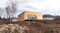 Izolace ploché střechy dřevostavby moderního rodinného domu